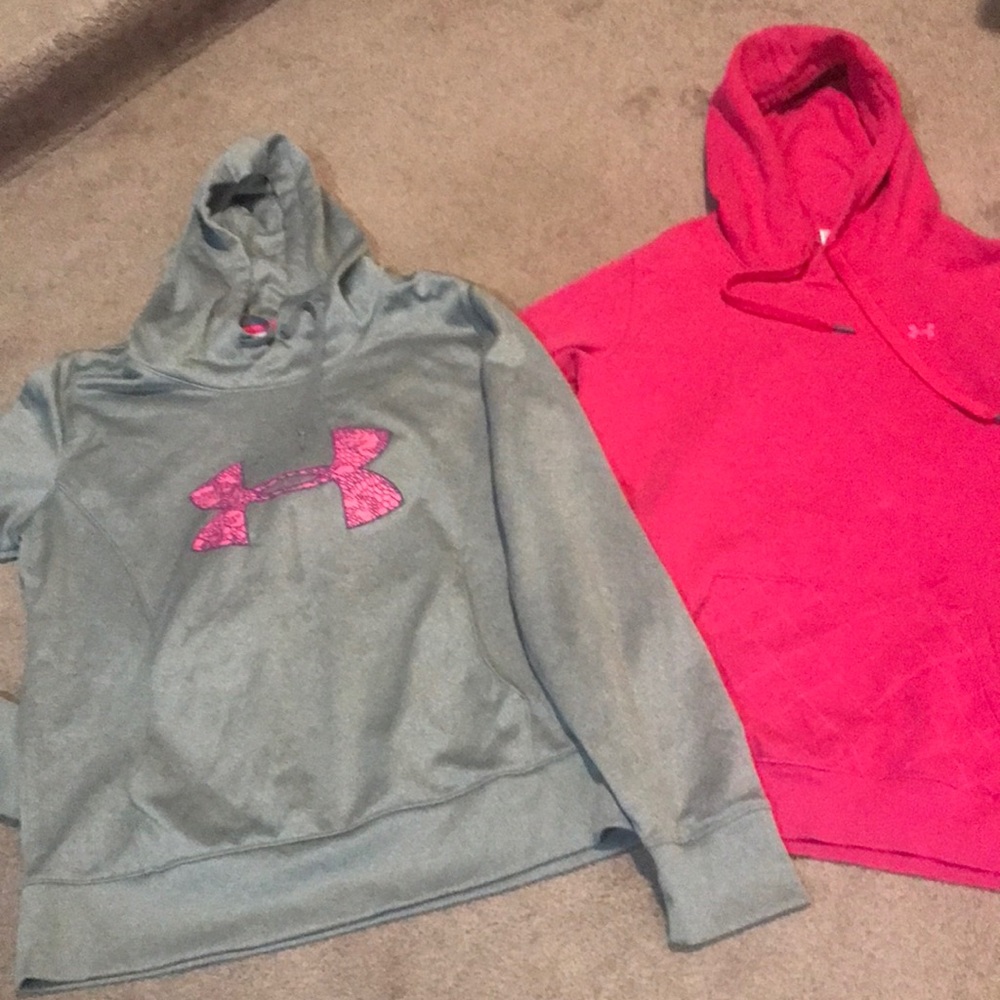 Two women’s large under Armour sweatshirts.